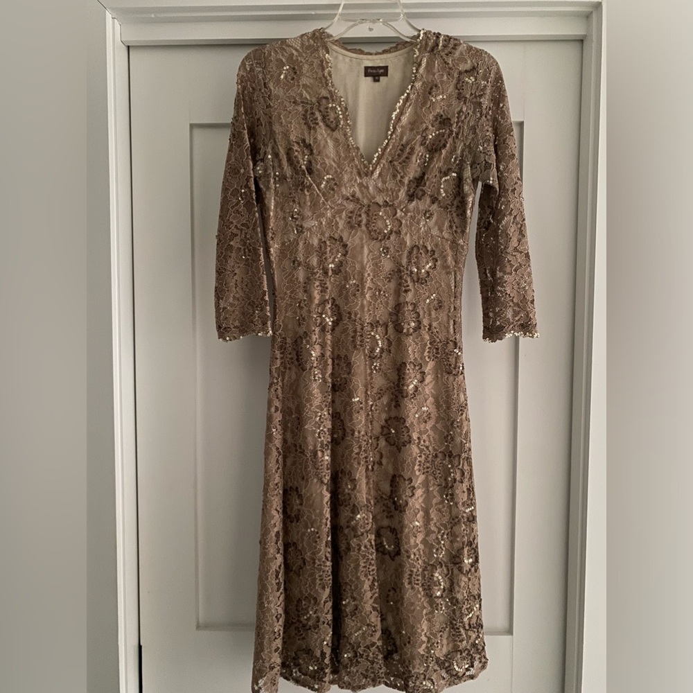 THIS DRESS IS VERY SPECIAL. I BOUGHT THIS IN LONDON . ITS A SIZE 10 IN THE U.K.